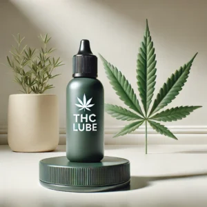 Bottle of THC lube with cannabis leaf design, elegantly displayed on a lid with soft lighting, highlighting its natural ingredients.