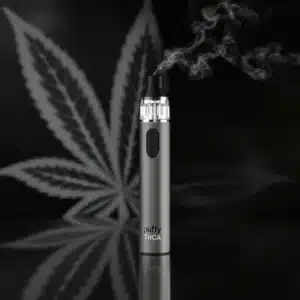 Modern vape pen emitting vapor, ideal for enjoying Puffy THCA products in a sleek and convenient way.