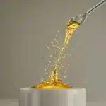 Solventless THCA hemp rosin extraction using a rosin press, releasing pure golden concentrate from hemp.