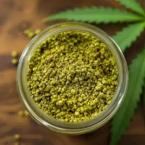 THCA shake in a glass jar with vibrant green hues, perfect for versatile cannabis use.
