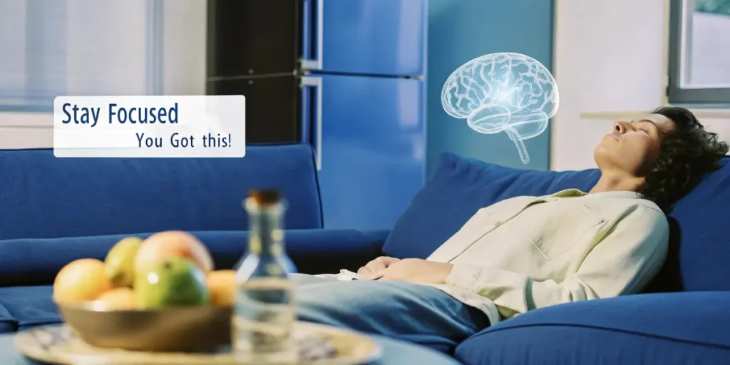 Person resting on a couch with a brain illustration and motivational text about staying focused.
