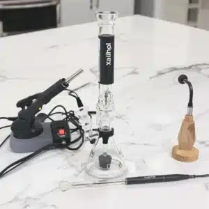 Dab rig and quartz banger setup for cold start dabs on a clean countertop.