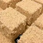 Rockwool cubes ready for cannabis seed germination, soaked and showing fibrous texture.