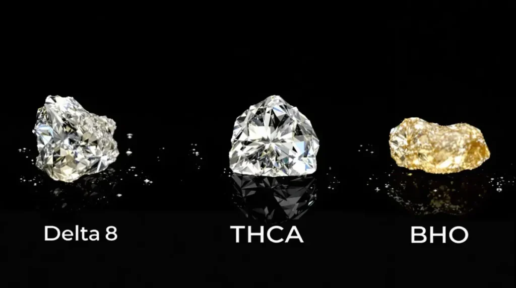 Cannabis joint filled with Delta-8 kief next to grinder and loose material on white paper.