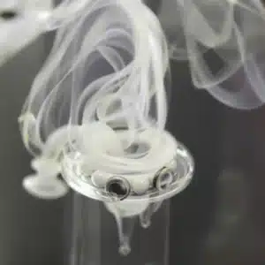 Spinner carb cap and terp pearls in action for efficient and flavorful dabbing.