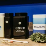 Detox drinks and capsules for THC removal displayed on a kitchen counter