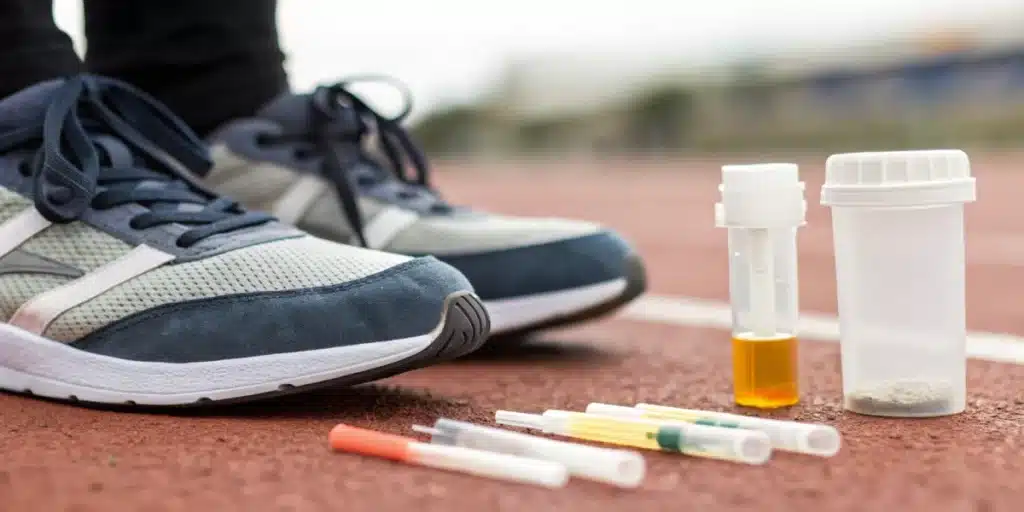 Doping test kit with THC strips and athletic shoes highlighting can athletes smoke weed policy