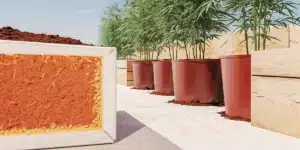 Hyper-realistic image showing cross-sections of large black pots revealing layered soil and white pebbles with tall cannabis plants.