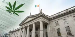 Realistic image of an Irish courthouse with cannabis legal documents, illustrating Ireland weed laws in action.