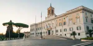 Realistic image of an Italian government building displaying legal cannabis signage, representing THC legal standards in Italy.